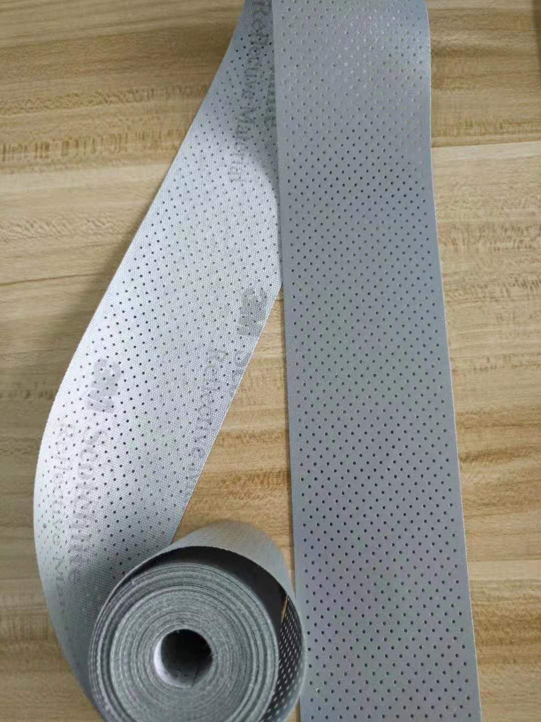 reflective perforated fabric with hole