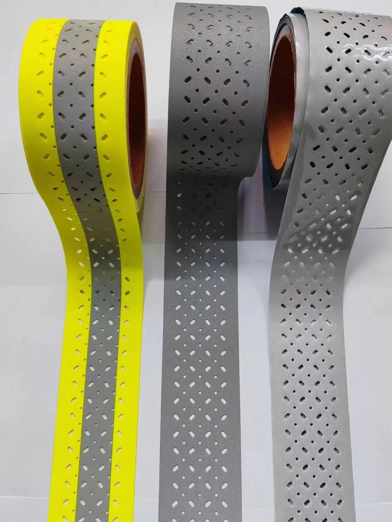 reflective perforated fabric with hole