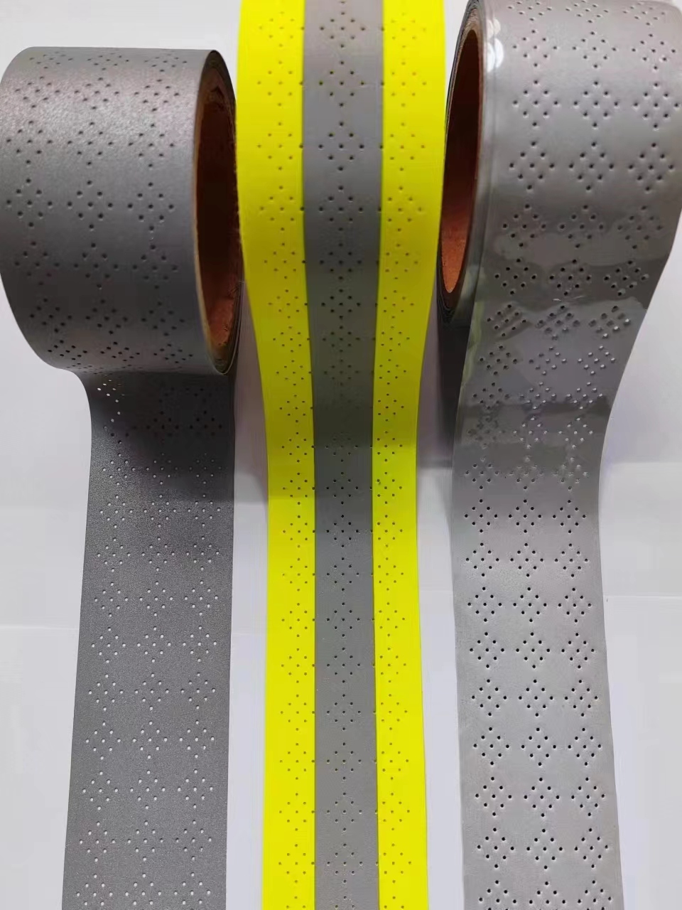 reflective perforated fabric with hole